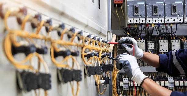 Professional Electrician technician working in Pinson, AL
